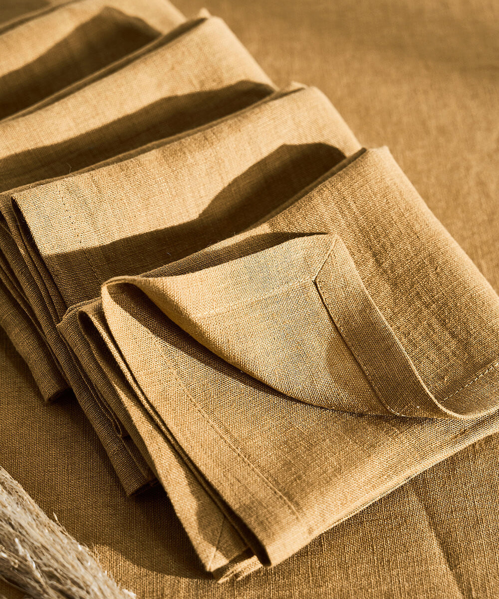 Linen napkins in mustard