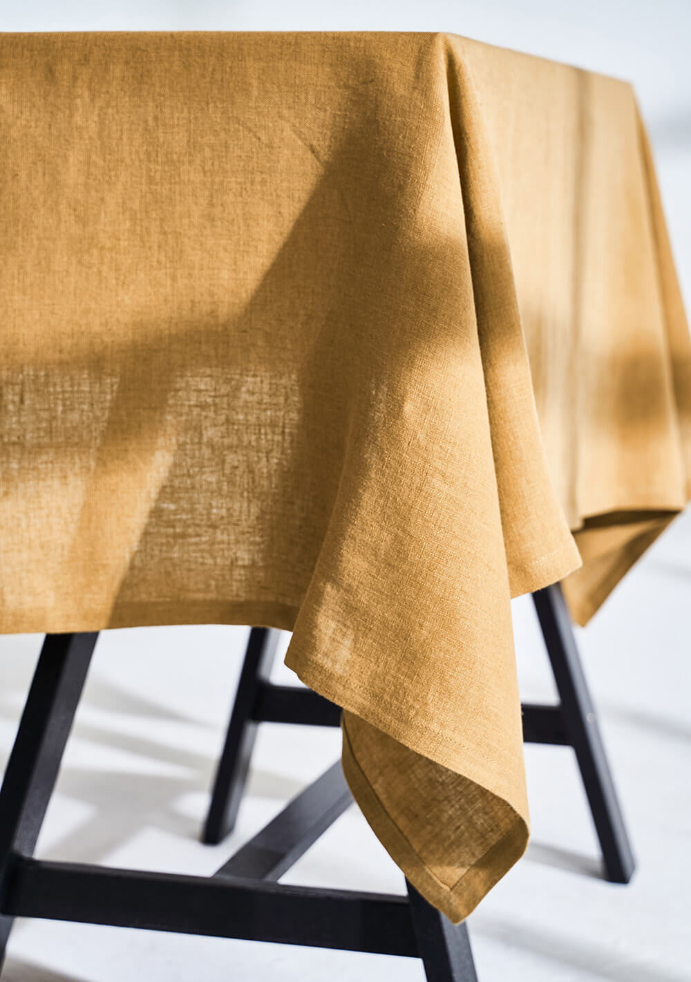 Linen tablecloth in mustard