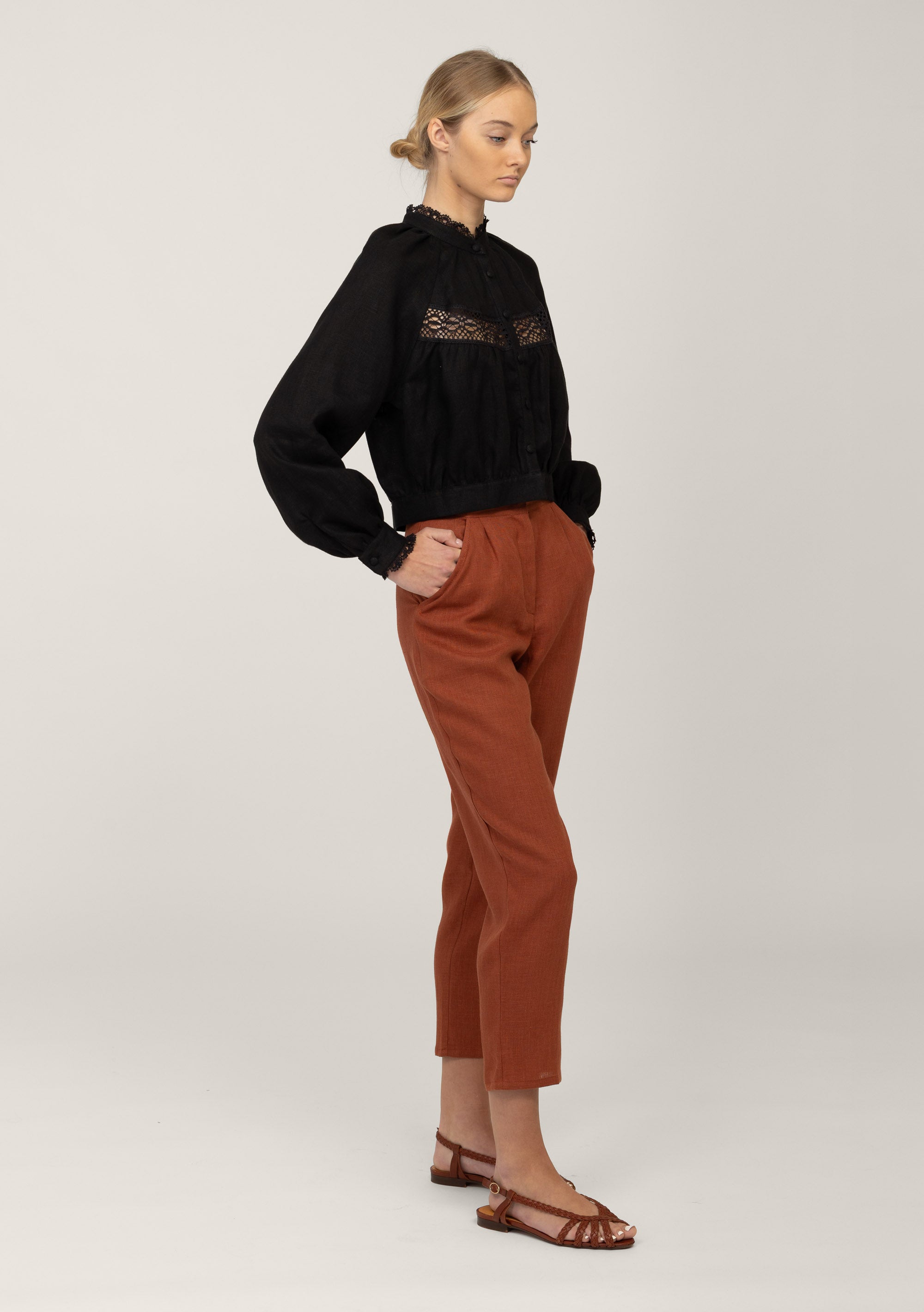 Black lace linen blouse Flore with rust linen trousers, side view