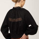 Lace insert on the back of black linen blouse Flore with balloon sleeves
