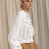 White linen blouse Flore with lace collar and balloon sleeves, side view